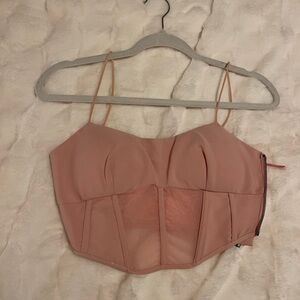 Never worn pink corset crop top, size small